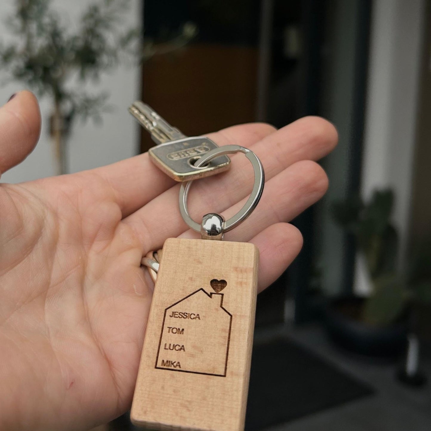 Schlüsselanhänger für Hotels mit Logo graviert