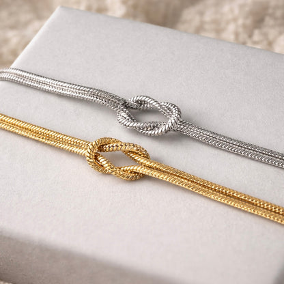 Knotenarmband aus Edelstahl in beiger Geschenkbox – ideales Geschenk